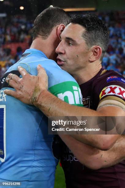 Billy Slater of Queensland and Boyd Cordner of the Blues embrace following game three of the State of Origin series between the Queensland Maroons...