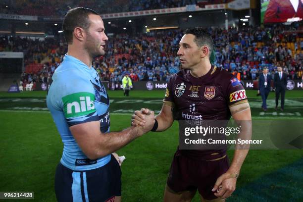 Billy Slater of Queensland and Boyd Cordner of the Blues embrace following game three of the State of Origin series between the Queensland Maroons...