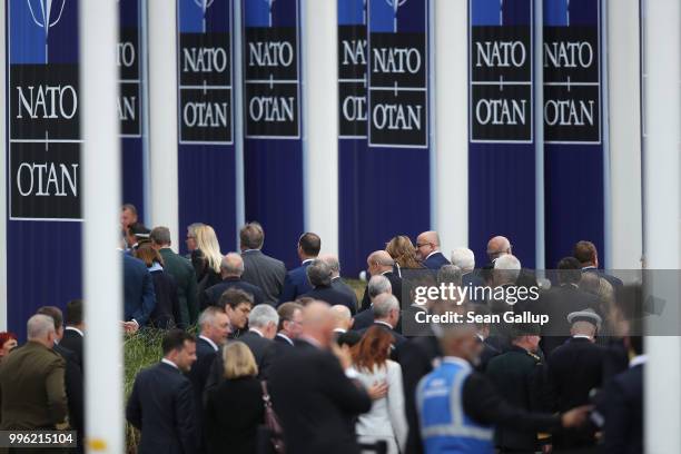 Guests depart after attending the opening ceremony at the 2018 NATO Summit at NATO headquarters on July 11, 2018 in Brussels, Belgium. Leaders from...