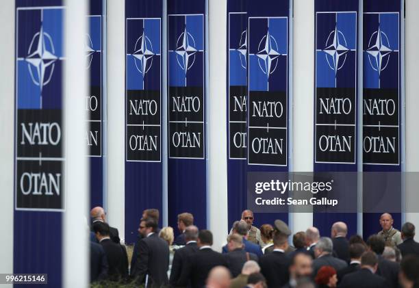 Guests depart after attending the opening ceremony at the 2018 NATO Summit at NATO headquarters on July 11, 2018 in Brussels, Belgium. Leaders from...