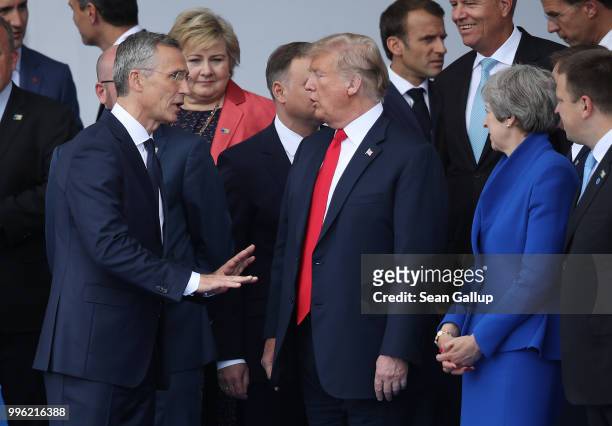 Secretary General Jens Stoltenberg, U.S. President Donald Trump and British Prime Minister Theresa May attend the opening ceremony at the 2018 NATO...