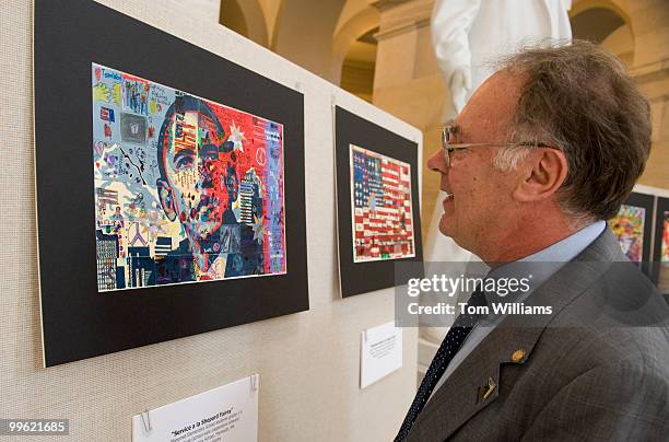 John Horejsi checks out art work by students from Manomet Elementary School in Plymouth, Mass., on display in Russell Building, June 1, 2009.