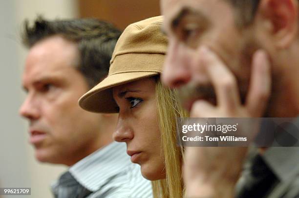 From left, professional poker players Chad Brown, Vanessa Rousso, and Barry Greenstein listen to a forum held by Poker Players Alliance entitled...