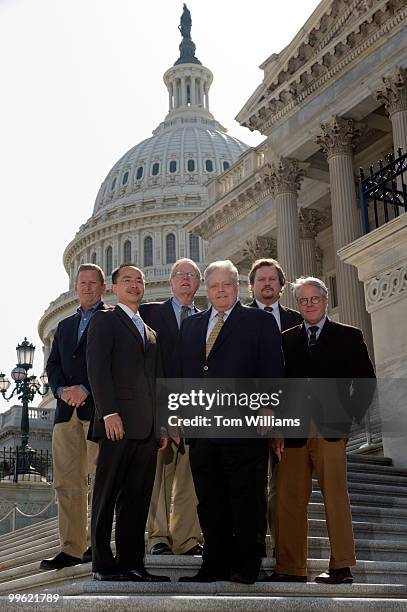 Senate Press Photographers Committee front row from left, Khue Bui, Scott Applewhite, Stephen Crowley, back row from left, Win McNamee, Dennis Brack,...