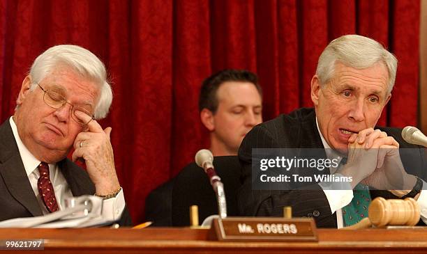 Reps. Harold Rogers, R-Ky., left, and Frank Wolf, R-Va., listen to testimony of Secretary of State Colin Powell, a House Appropriations Committee...