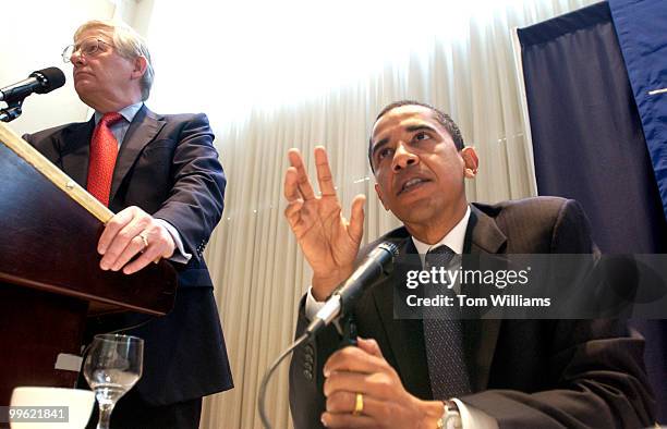 Sen. Barack Obama, D-Ill., right, speaks during a Lobbying Reform Summit, held at the National Press Club, alongside James Thurber, director, Center...