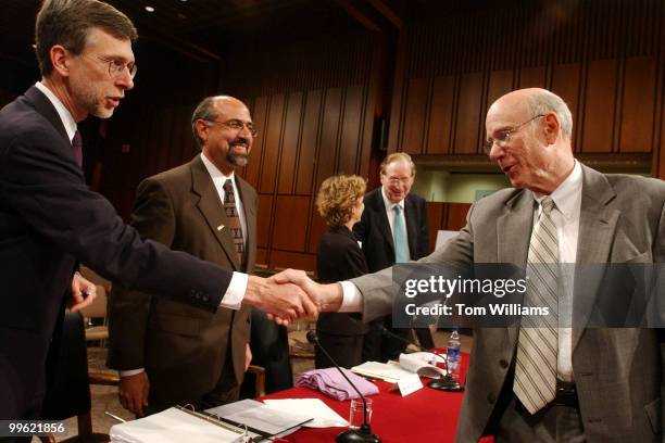 Sen. Pat Roberts, R-Kan., right, greets James Dempsey of the Center for Democracy and Technology as Gregory Nojeim of the Washington Legislative...