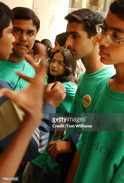 Aneesha Shah of India, listens to her peers of Indians and Pakistanis that make up Seeds for Peace discuss religion before a meeting with staff...