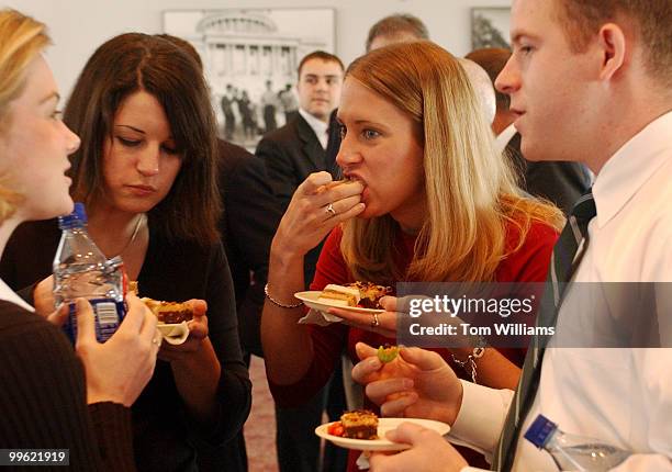 Sen. Don Nickles, R-Okla., staffers from left, Abbie Smith, Allison Cappa, Adria Morgan, Josh Benoit, enjoy peanut butter snacks at Peanut Butter Day...