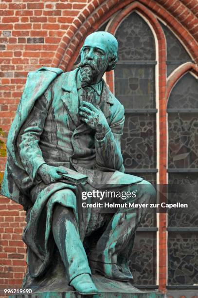 monument of emanuel geibel, german poet, luebeck, schleswig-holstein, germany - emanuel geibel stock-fotos und bilder
