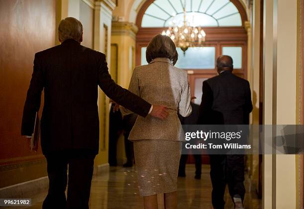 House Majority Leader Steny Hoyer, D-Md., left, Speaker Nancy Pelosi, D-Calif., and House Majority Whip James Clyburn, D-S.C., leave a news...