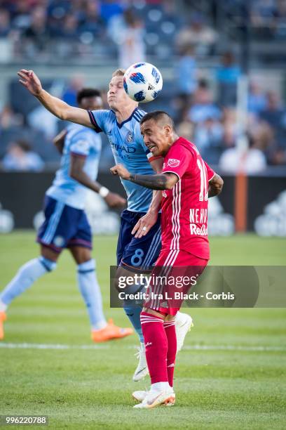 Alexander Ring of New York City and Alejandro Romero Gamarra of New York Red Bulls go up for the header during the Major League Soccer Hudson River...