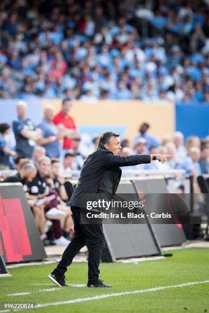 Head Coach Domenec Torrent of New York City gives direction to his team during the Major League Soccer Hudson River Derby match between New York City...