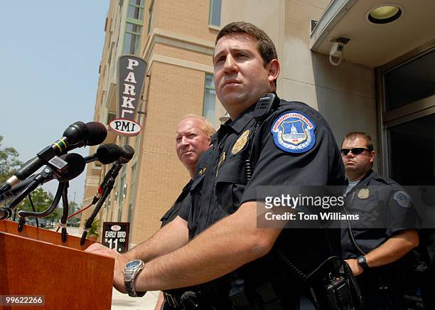 Fraternal Order of Police Chairman Andy Maybo, center, talks with reporters during a news conference in which members of the Capitol Police and...