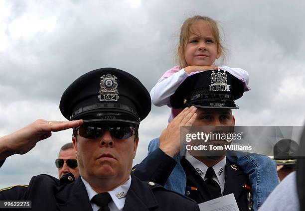 Julia Boris sits on the shoulders of her father Det. Greg Boris of the Baltimore PD, at the 25th Annual National Peace Officers' Memorial Service....