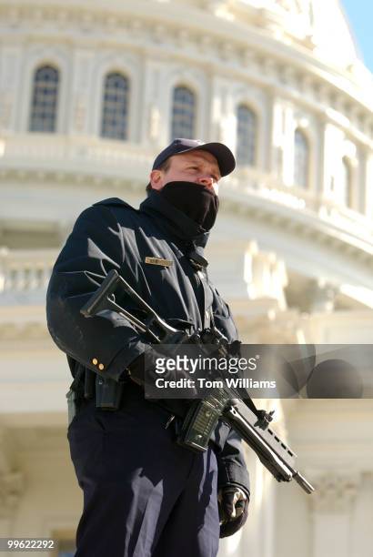 Capitol Police Officer PFC Steve Karlinchak, stands guard on the West Front of the Capitol, armed with an HK G36.
