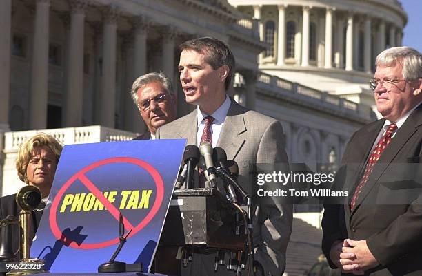 Rep. Rob Portman, R-OH, along with Ileana Ros-Lehtinen, R-FL, Rep. Dick Armey, R-TX, and Speaker Dennis Hastert, R-IL, appear at a press conference...