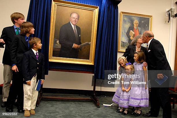 Rep. Sherwood Boehlert, R-N.Y., Chairman House Science Committee, kisses his wife Marianne at an unveiling ceremony for his portrait. Grandchildren...