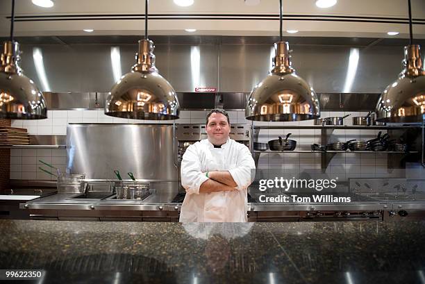 Anthony Acinapura, chef of Potenza, located at 15th and H Sts., NW, poses for a picture in the restaurant's kitchen, March 18, 2009.