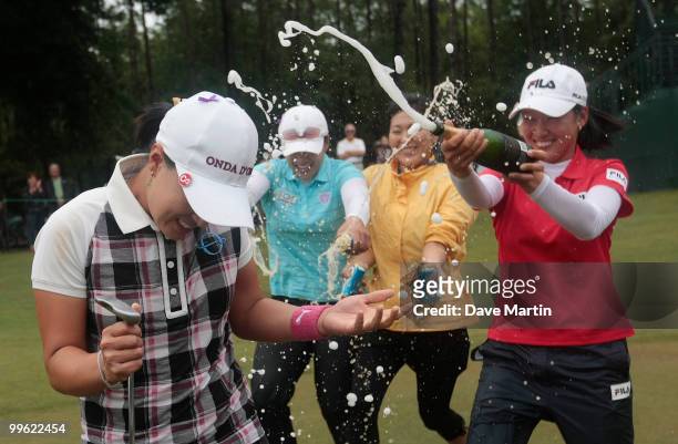 Se Ri Pak of South Korea is doused with beer and champagne after winning a sudden death playoff in the Bell Micro LPGA Classic at the Magnolia Grove...