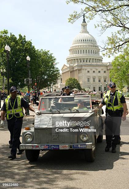 Capitol Police move the car of Sen. Richard Burr, R-N.C., during a protest by ADAPT, an activist group for people with disabilities, on Constitution...