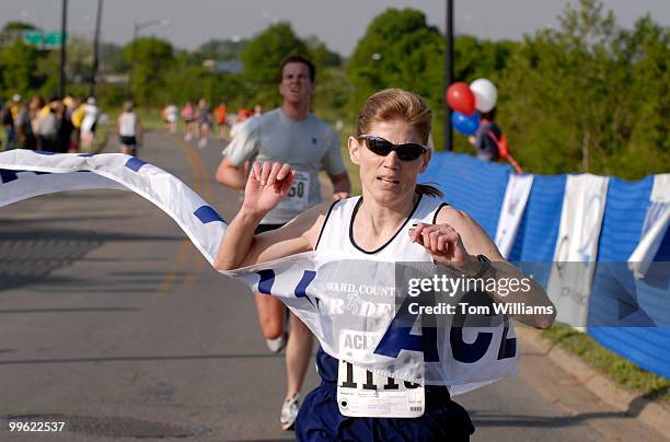 Vicki Lang, Department of Veterans Affairs, was the first woman finisher at the 25th annual ACLI Capital Challenge 3 mile race in Anacostia Park.