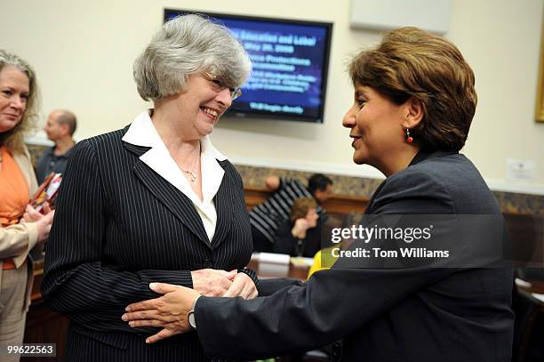 Rep. Lynn Woolsey, D-Calif., left, greets Janet Murguia, president, National Council of La Raza, before a House Workforce Protections Subcommittee...