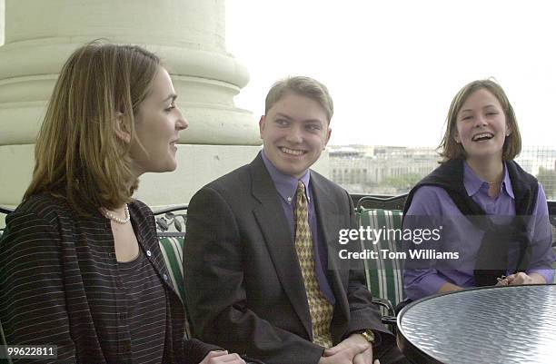 Climbers Adam Ingols, Abby Moon, and Meg Bourne pose on the Speakers's balcony.