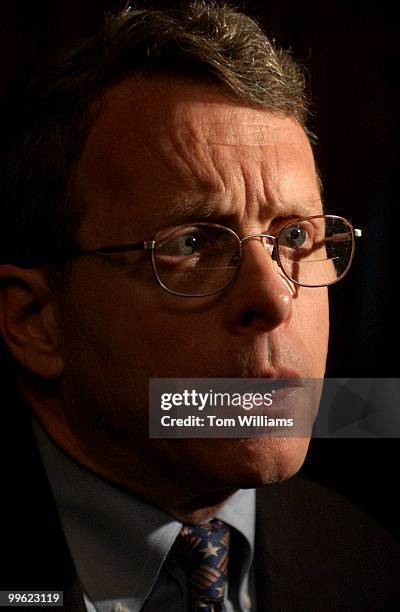 Sen. Mike DeWine, R-Ohio, speaks to a reporter after a news conference in support of passage of the $15 billion bipartisan HIV/AIDS relief bill.