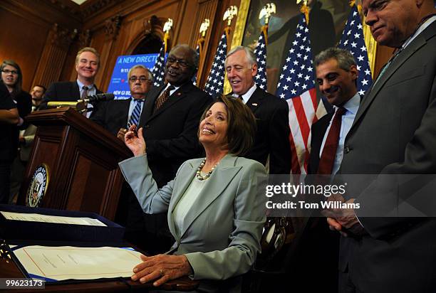 Speaker Nancy Pelosi, D-Calif., prepares to sign the Emergency Economic Stabilization Act, after the House passed the legislation, October 3, 2008....