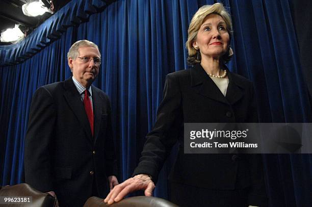 Senate Minority Leader Mitch McConnell, R-Ky., and Sen. Kay Bailey Hutchison, R-Texas, leave a news conference following the Senate's vote on whether...