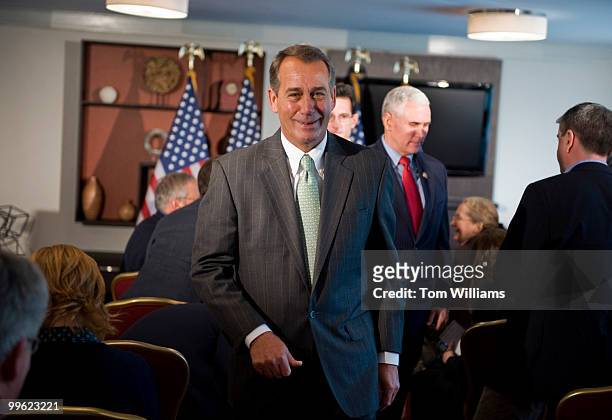 House Minority Leader John Boehner, R-Ohio, leaves a news conference with Conference Chairman Mike Pence, R-Ind., right, and House Minority Whip Eric...
