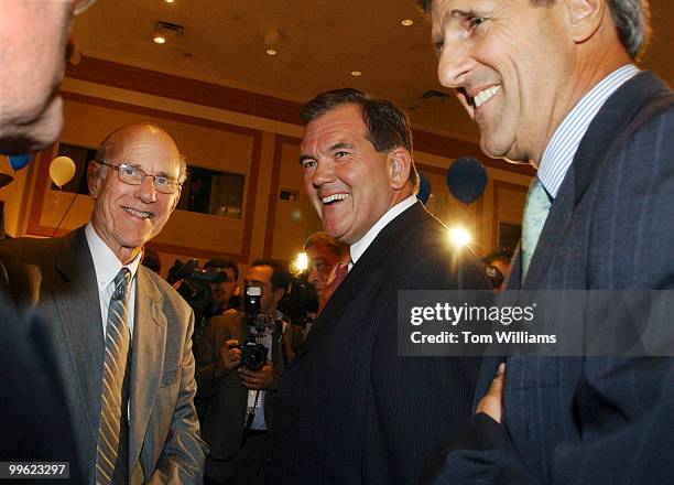 From left, Sen. Pat Roberts, R-Kan., Director of Homeland Security, Tom Ridge, and Sen. John Kerry, D-Mass., talk to exhibitors at the Small Business...