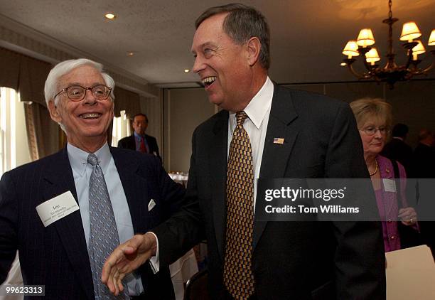 Rep. Mike Oxley, R-Ohio, shares a laugh with Lee Verstandig, of the National Association of Chain Drug Stores, upon arrival at the Ripon Society...