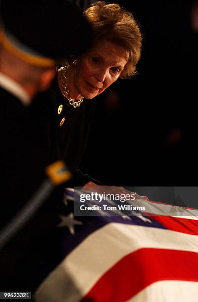 Nancy Reagan pays respects to her late husband Ronald Reagan, during a State Funeral held in the Rotunda of the U.S. Capitol.