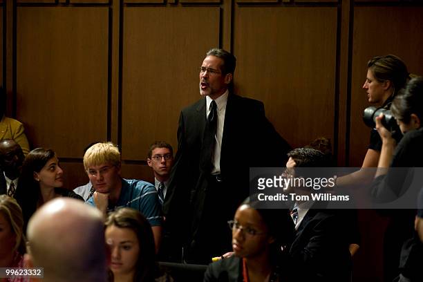 Protester is removed from the confirmation hearing of Supreme Court nominee Sonia Sotomayor in the Senate Judiciary Committee hearing in 216 Hart...