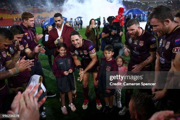 Billy Slater of Queensland talks to team mates after playing his final match for Queensland following game three of the State of Origin series...