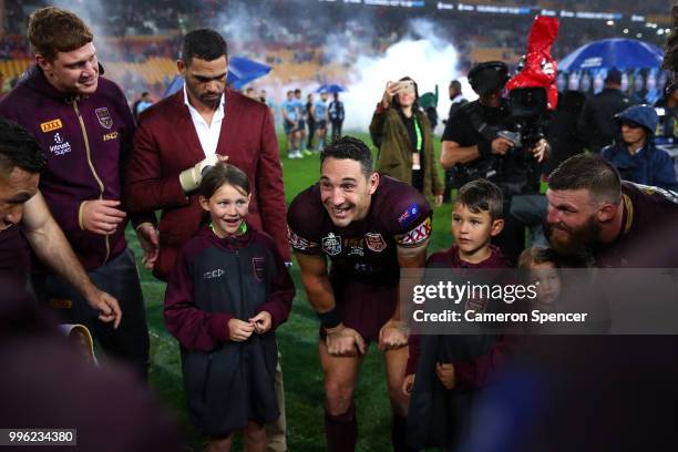 Billy Slater of Queensland talks to team mates after playing his final match for Queensland following game three of the State of Origin series...