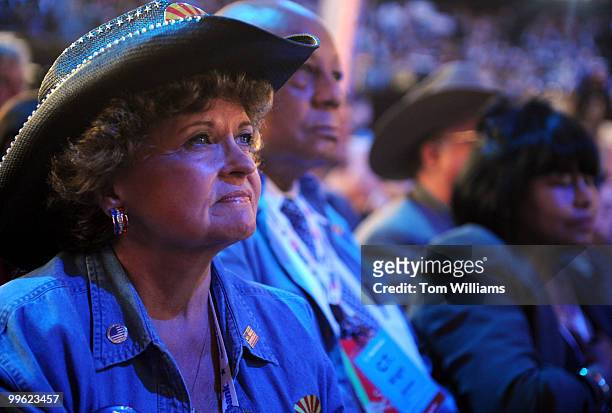 Arizona delegate Gail Griffen watches a film presentation on second night of the Republican National Convention held at the Excel Center in St. Paul,...