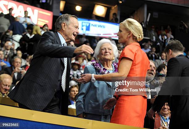 George and Barbara Bush greet Cindy McCain, wife of Sen. John McCain, on second night of the Republican National Convention held at the Excel Center...