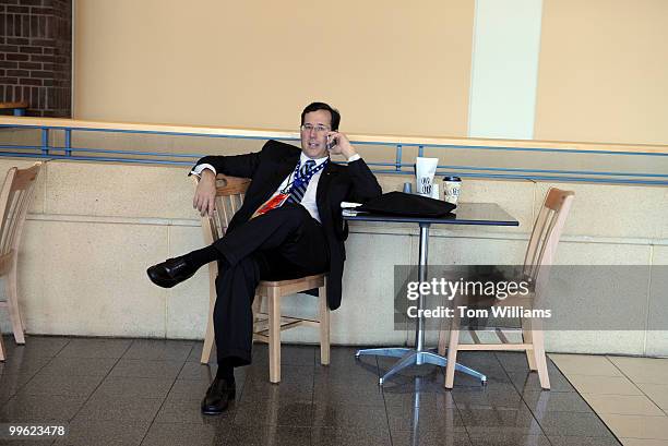 Former Sen. Rick Santorum talks on the phone in the River Center on the third day of the Republican National Convention, September 3, 2008.