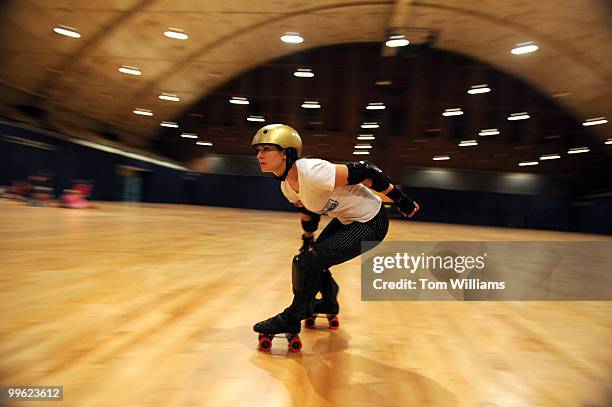 Discordia of team Secretaries of Hate, skates during a practice of the D.C. Rollergirls at the D.C. Armory, April 22, 2008.
