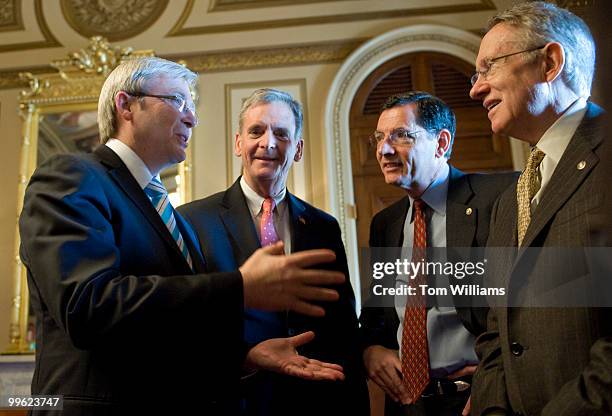 Australian Prime Minister Kevin Rudd, left, talks with, from left, Sens. Judd Gregg, R-N.H., John Barrasso, R-Wyo., and Senate Majority Leader Harry...