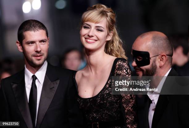 Actor Melvil Poupaud with actress Louise Bourgoin and director Gilles Marchand attend the "Black Heaven" Premiere at the Palais des Festivals during...