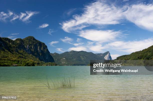 mondsee lake with drachenwand rock wall at the back, salzkammergut, upper austria, austria - vocklabruck stock pictures, royalty-free photos & images