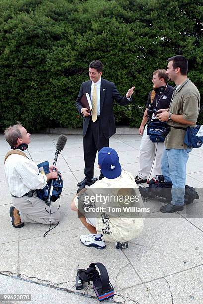 Rep. Paul Ryan, R-WI, talks to camera crews staked out near the House Steps waiting to film Rep. Gary Condit, D-CA.