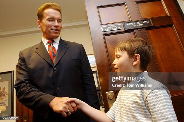 Actor Arnold Schwarzenegger meets Will Prince son of scheduler to Rep. Mike Castle, R-Del., Helen Prince. Schwarenegger was on the Hill to discuss...