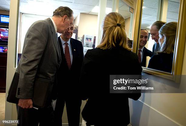 Sens. John Rockefeller, D-W.V., left, and Charles Schumer, D-N.Y., confer before a news conference on health care reform, July 15, 2009.