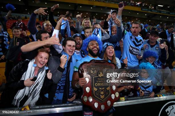 Josh Addo-Carr of the Blues poses with fans after winning the series following game three of the State of Origin series between the Queensland...