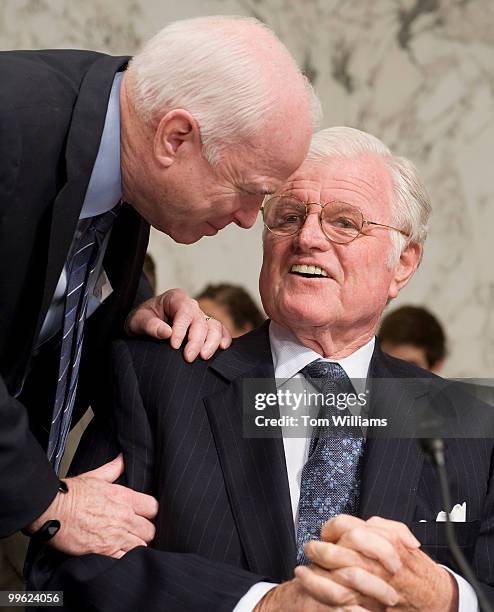 Sen. John McCain, R-Ariz., talks with Sen. Ted Kennedy, D-Mass., chairman of the Senate Health, Education, Labor, and Pensions Committee, during the...